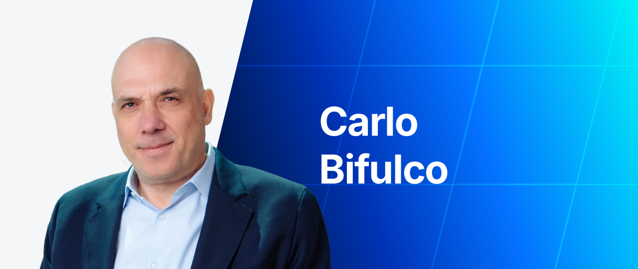Headshot card featuring Carlo Bifulco alongside her name against a blue gradient background.